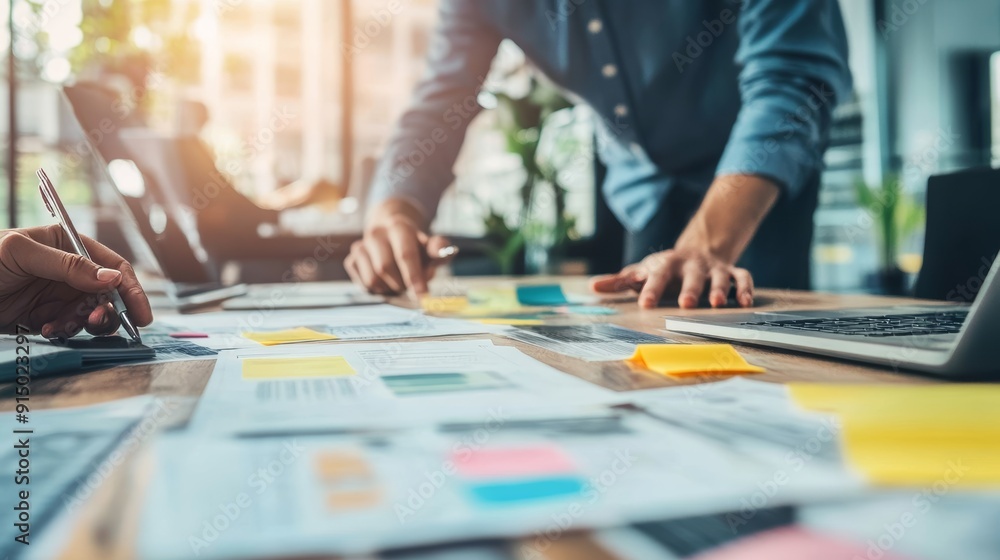 Entrepreneur sharing detailed business workflow insights with colleagues for operational excellence Entrepreneur sharing detailed business workflow insights with colleagues for operational excellence