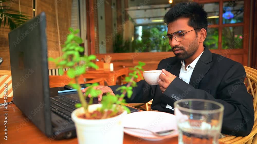 Professional Man Working With Laptop in Cafe Professional Man Working With Laptop in Cafe