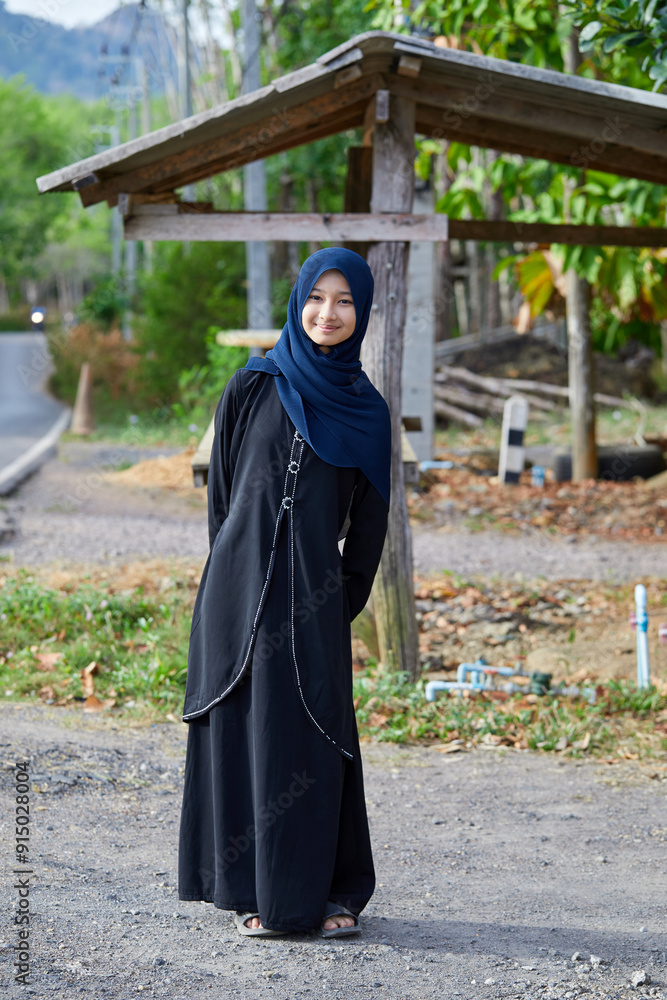 Portrait of asian muslim girl in hijab fashion smiling Portrait of asian muslim girl in hijab fashion smiling