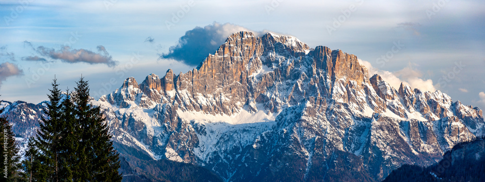Dolomites, Italy. Civetta mountain at sunrise viewed from Pieve di Livinalongo near Arabba. Wide panorama