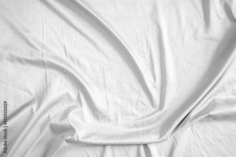 Naklejka premium Abstract white wrinkled bedding sheet fabric texture background