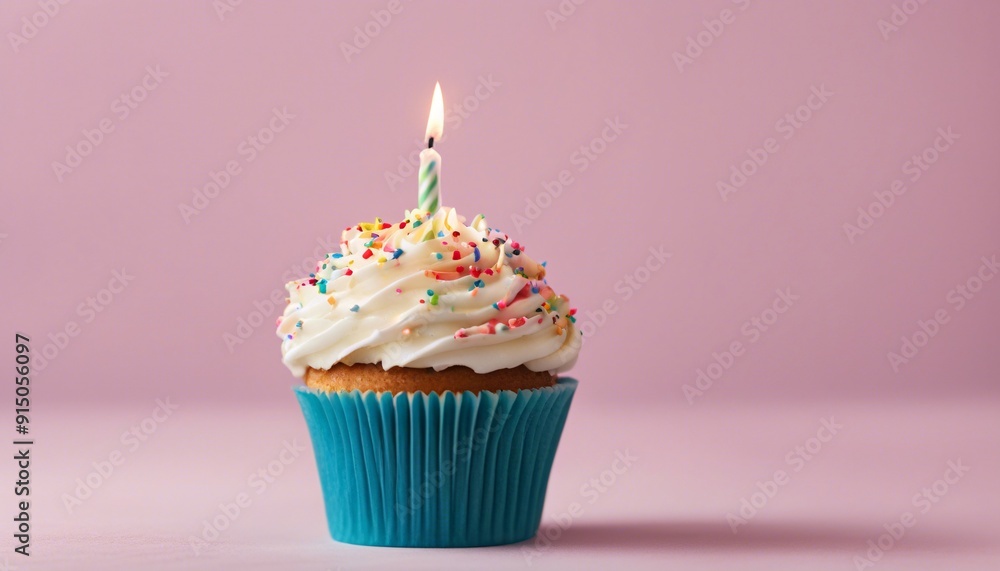 Birthday Cupcake with One Candle Isolated on a solid Copy Space Background Birthday Cupcake with One Candle Isolated on a solid Copy Space Background