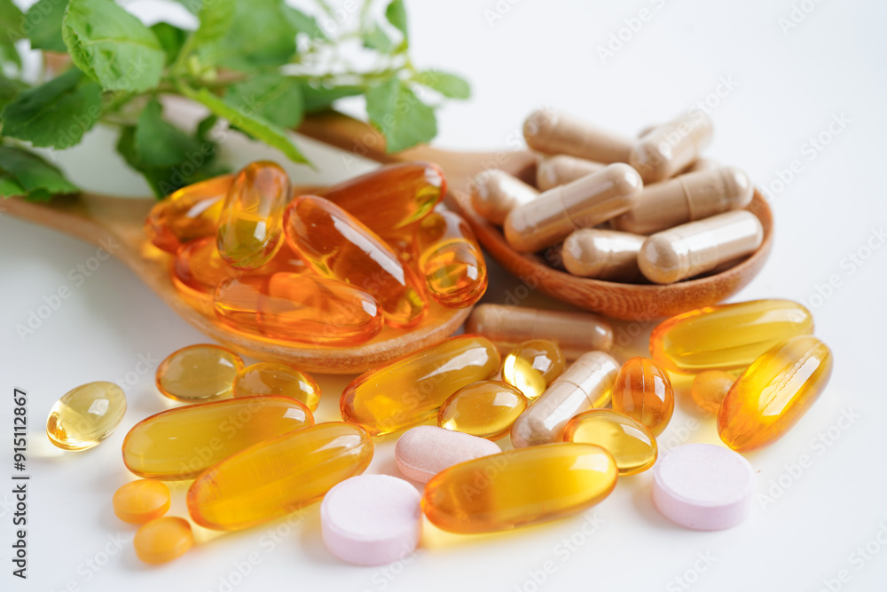 Alternative medicine herbal organic capsule with vitamin E omega 3 fish oil, mineral, drug with herbs leaf natural supplements for healthy good life. Alternative medicine herbal organic capsule with vitamin E omega 3 fish oil, mineral, drug with herbs leaf natural supplements for healthy good life.
