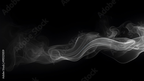 Abstract smoke swirling against a black background photo