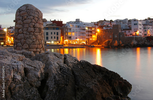 Sunset view in the pretty seaside village of La Escala, located on the Catalan Costa Brava, Spain