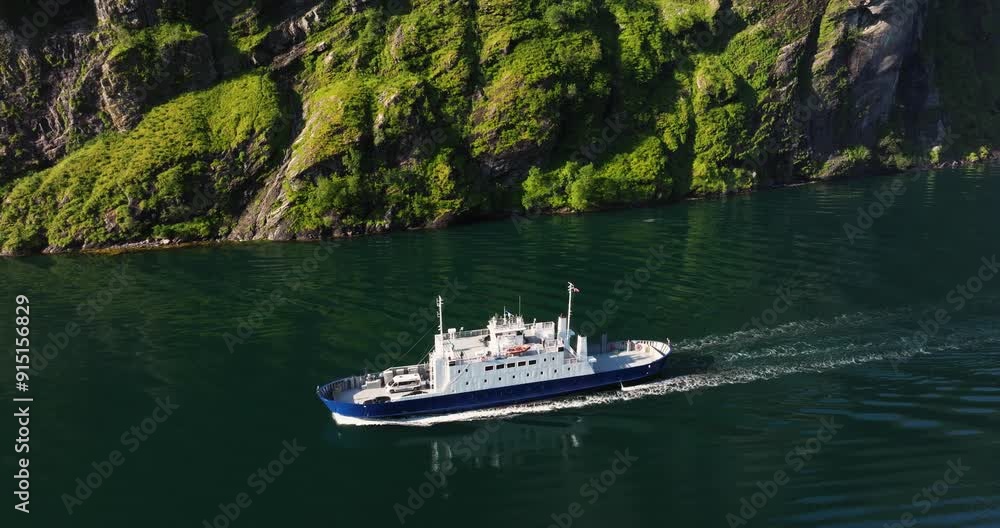 Aerial Tracking Shot of Geiranger Ferry Boat with Cars in Norwegian Fjord Aerial Tracking Shot of Geiranger Ferry Boat with Cars in Norwegian Fjord