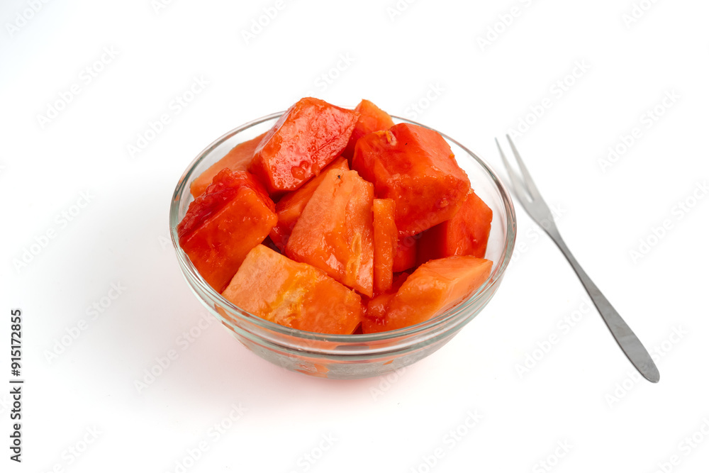 papaya slices in clear bowl isolated white background. Perfect for design element, product packaging, promotion, or any commercial purposes. papaya slices in clear bowl isolated white background. Perfect for design element, product packaging, promotion, or any commercial purposes.