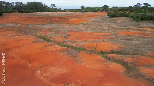 Red rocky landscape Barreiro da Faneca at Santa Maria, Azores, aerial photo