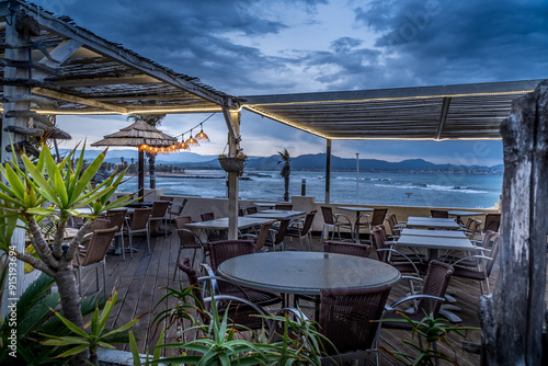 pretty driftwood terrace in winter at nightfall - provence - france