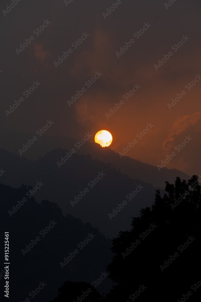 eautiful Dawn with Orange Sun Over Layered Mountains, Chamba, Himachal Pradesh