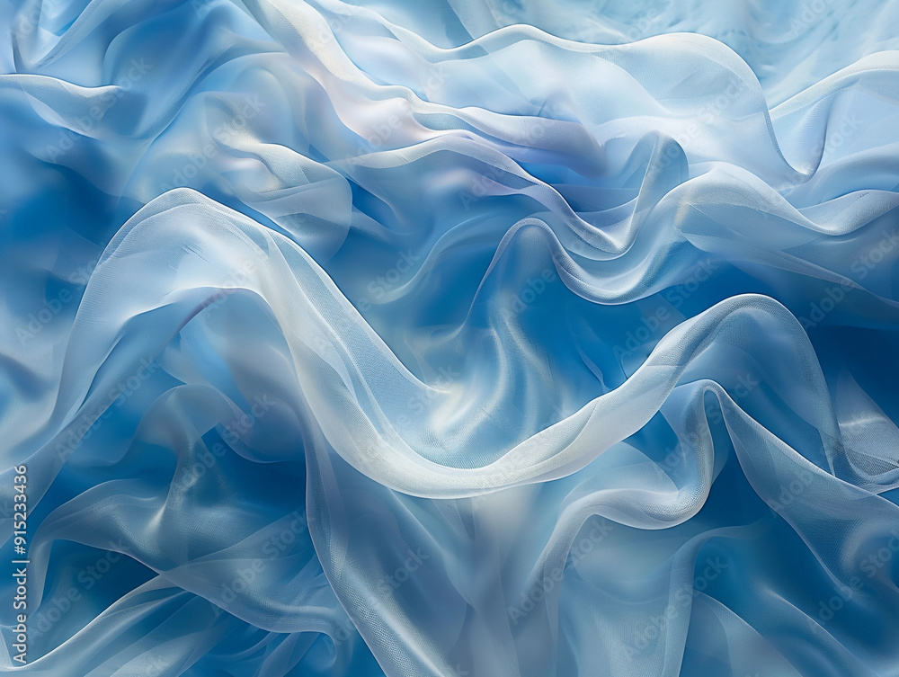 Delicate blue silk fabric draped elegantly with soft waves and gentle folds Delicate blue silk fabric draped elegantly with soft waves and gentle folds