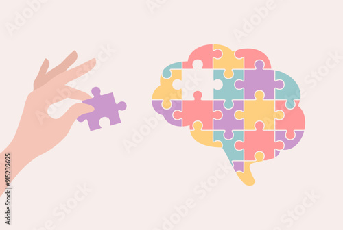 A hand placing a missing puzzle piece into a colorful puzzle brain. Flat vector illustration