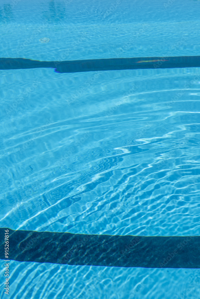 Obraz premium swimming pool with blue water, close up of swimming pool.