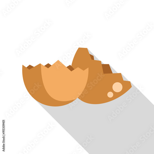 Empty, broken eggshell is lying on a surface, casting a long shadow