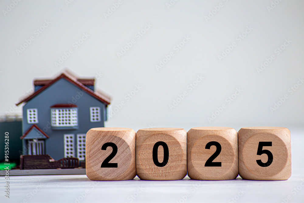 2025 New year. New year property investment concept. Wooden blocks spell 2025 New year. New year property investment concept. Wooden blocks spell