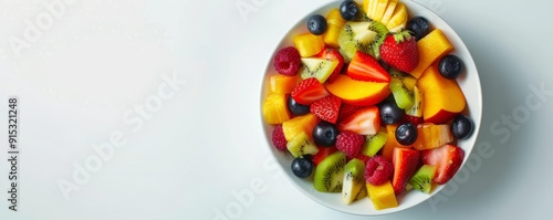 Bowl of fresh fruit salad on white background, 4K hyperrealistic photo