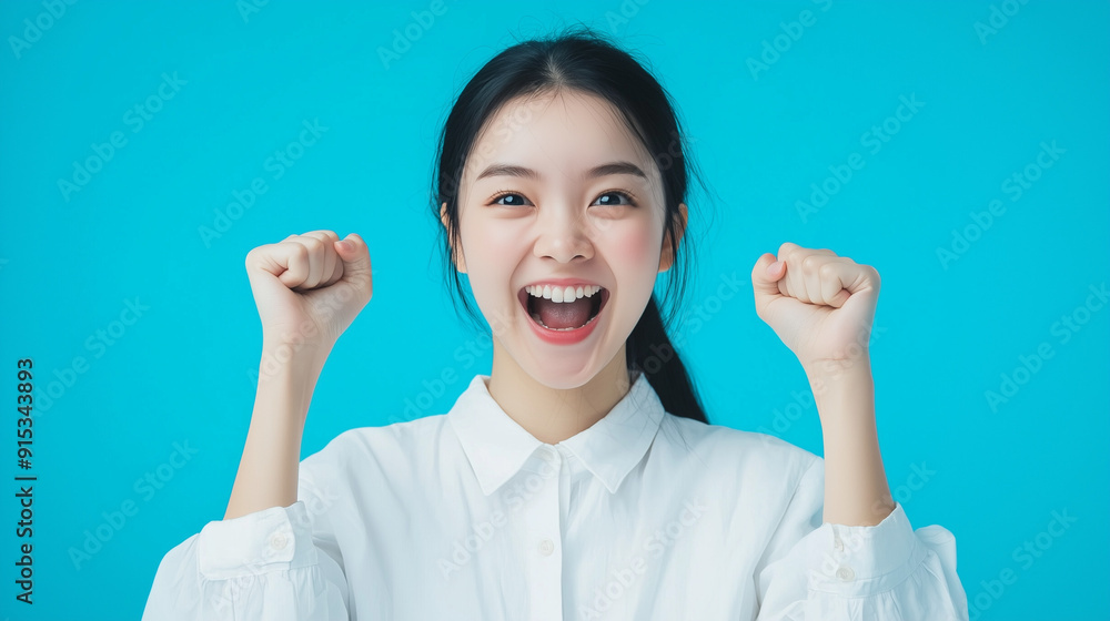 Asian Woman Happy Black Hair Blue Background Isolated Celebration Joy Thailand Cheerful Smile Positive Energy Female Model Bright Tone Happiness Fun Vibrant Simple Backdrop Image Asian Woman Happy Black Hair Blue Background Isolated Celebration Joy Thailand Cheerful Smile Positive Energy Female Model Bright Tone Happiness Fun Vibrant Simple Backdrop Image