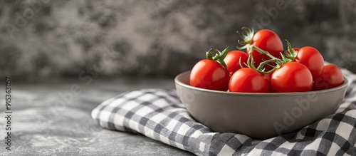 Grey bowl with fresh organi...