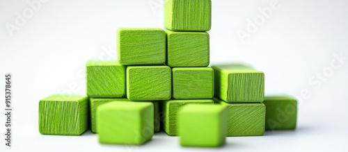 Green wooden blocks and bui...