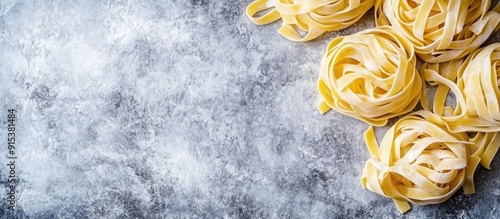 Uncooked pasta on a light g...