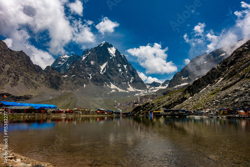 Manimahesh Lake, nestled in Himachal Pradesh's Higher Himalayas, is a sacred pilgrimage site for Hindus and Buddhists, dedicated to Lord Shiva. photo