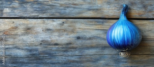 Vegan blue onion on a woode...