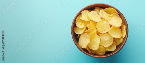 Crispy potato chips in a bo...