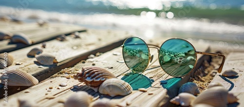 Seashells on a green wooden...