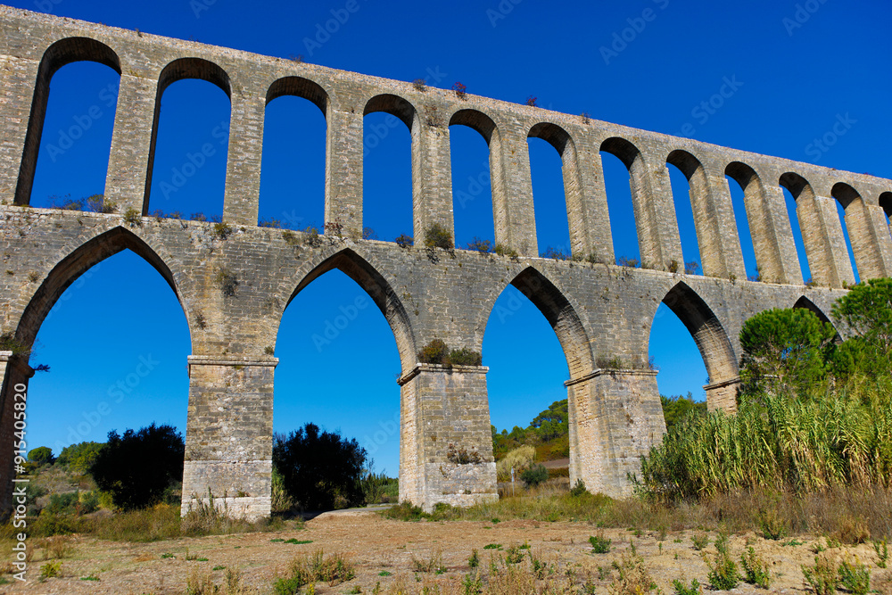 Portugal aqueduct in Tomar on a sunny autumn day Portugal aqueduct in Tomar on a sunny autumn day