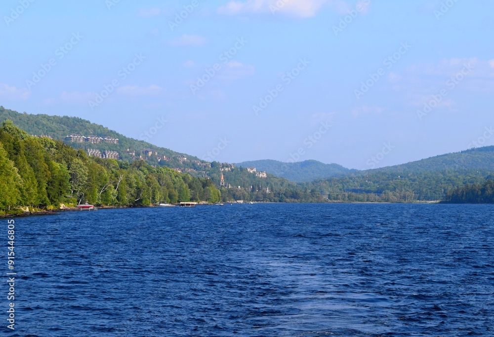 lake view from Lake Tremblant towards Mont-Tremblant mountain village, Laurentian Mountains Quebec Canada lake view from Lake Tremblant towards Mont-Tremblant mountain village, Laurentian Mountains Quebec Canada