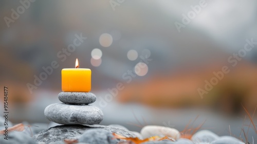 Tranquil Candle Display With Stones and Soft Bokeh Background at Dusk