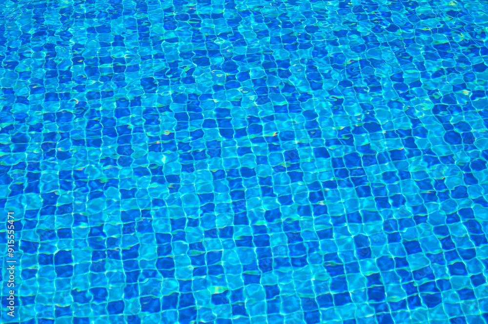 Overhead view of blue water surface abstract in a pool Overhead view of blue water surface abstract in a pool