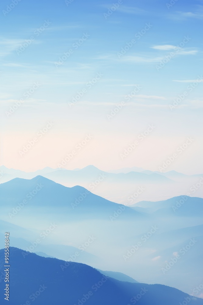 Obraz premium Serene landscapes with mountains and clear blue skies on sunny days.