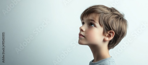 Thoughtful child with short...