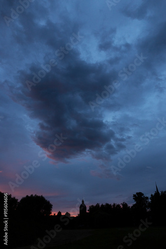 Sunset at park reibnitz Dammgarten. Mecklenburg Porpommern East Germany. Twilight. Evening. Clouds. 