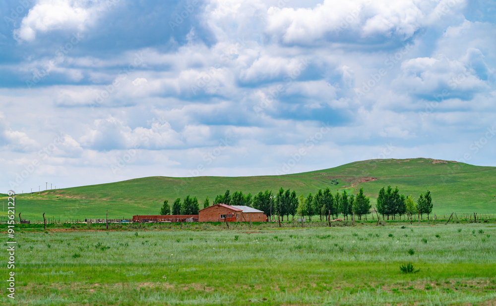 old house on grassland, green field and sky old house on grassland, green field and sky