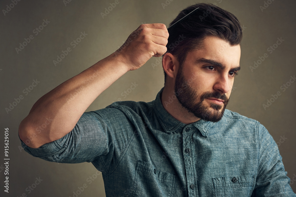 Man, self care and comb on studio background for grooming, confident haircare and maintenance. Male person, cosmetic tool and brushing for getting ready, treatment and preparation by beauty product Man, self care and comb on studio background for grooming, confident haircare and maintenance. Male person, cosmetic tool and brushing for getting ready, treatment and preparation by beauty product