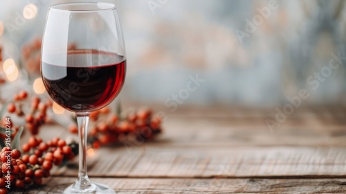 Red Wine Glass With Berries on Wooden Table During Evening Gathering