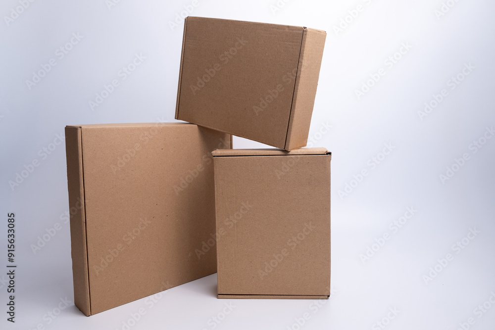 Brown paper box. Cardboard box isolated on white background. Place for text. Gift box Brown paper box. Cardboard box isolated on white background. Place for text. Gift box