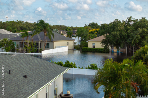 Flooded houses from hurricane Debby rainfall water in Laurel Meadows community in Sarasota, Florida. Aftermath of natural disaster in USA south photo