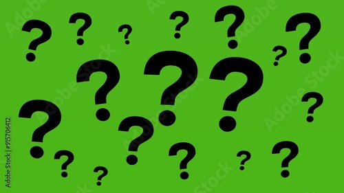 a large number of question marks on the green screen
