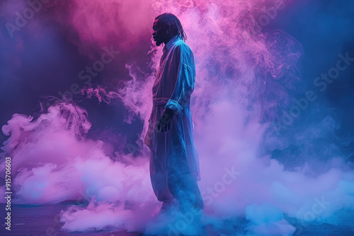 Creative portrait of man in colorful neon smoke