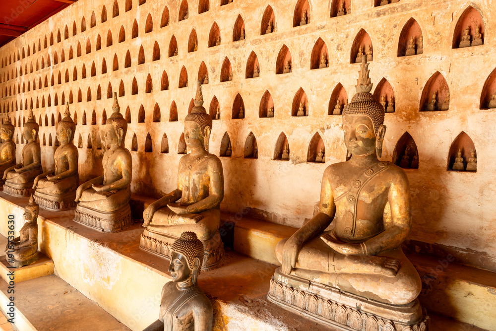 Fototapeta premium cloister wall with more than 2,000 ceramic and silver Buddha images in Wat Si Saket features in Vientiane , Laos