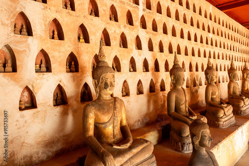cloister wall with more than 2,000 ceramic and silver Buddha images in Wat Si Saket features in Vientiane , Laos