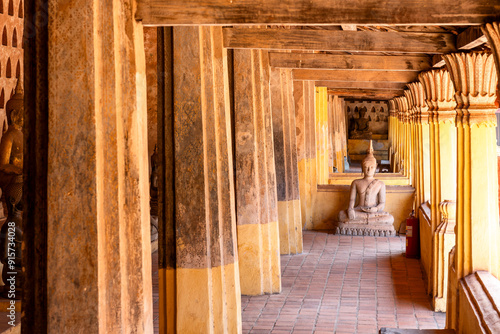 cloister wall with more than 2,000 ceramic and silver Buddha images in Wat Si Saket features in Vientiane , Laos photo