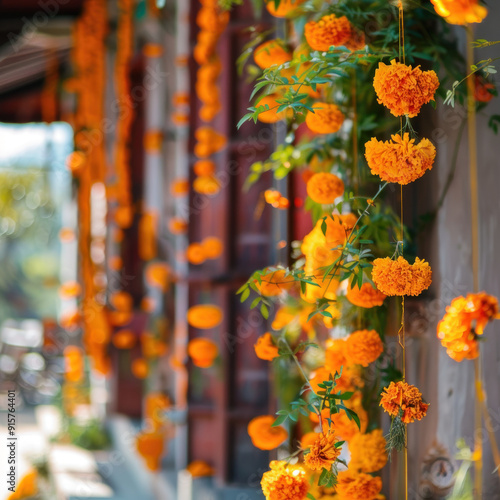 Marigold garlands draping along the house's exterior, Day of the Dead, blurred background. photo