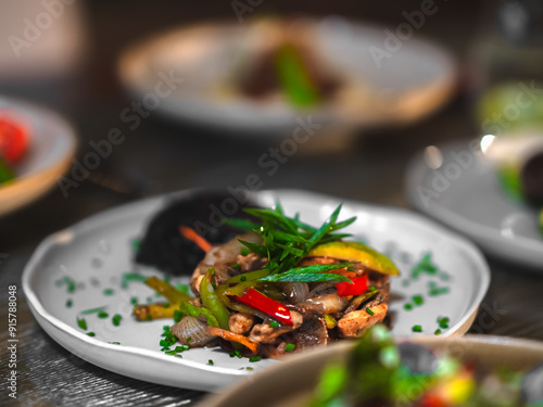 A vibrant and nutritious plate featuring an assortment of fresh vegetables, lean proteins
