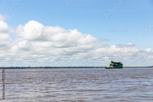 Navigating the Amazon River. In the Amazon jungle, near Iquitos, Peru. South America.