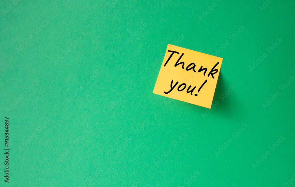 Thank you symbol. Steaky notes with words Thank you. Beautiful green background. Business and Thank you concept. Copy space. Thank you symbol. Steaky notes with words Thank you. Beautiful green background. Business and Thank you concept. Copy space.