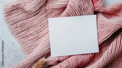 Cozy Knitting Setup With Yarn and Blank Notebook on Soft Sweater in Autumn Se...